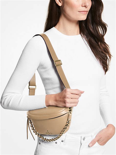 michael kors pebbled leather sling pack|Michael Kors slater backpack small.